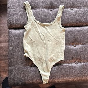 Women’s body suit. Color green. Size medium.